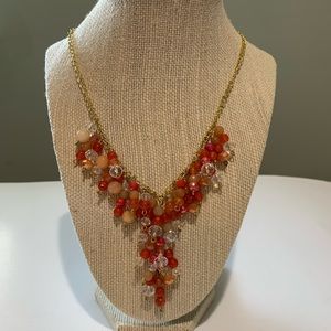 Handmade stone and crystal Necklace. 21”. Gold color. Orange. Beautiful.